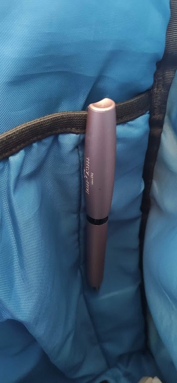 Faber-Castell Essentio in Rose Gold Aluminium clipped into the Insert of a Backpack with Blue and Black Lining